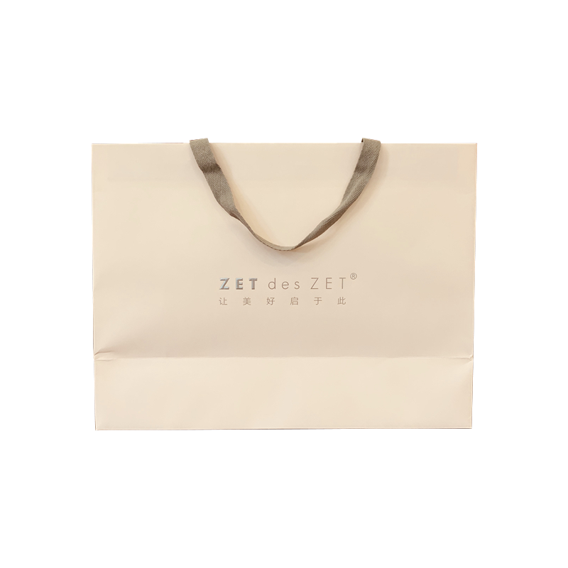 La coutume en gros a imprimé votre propre logo emballant le sac de papier d'achats de cadeau avec des poignées